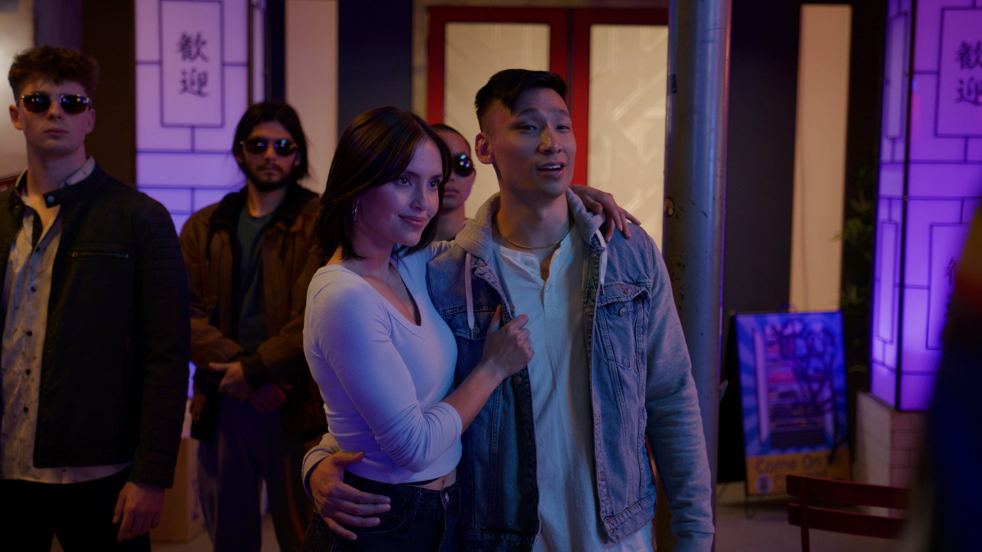 Five people stand ready to fight. 